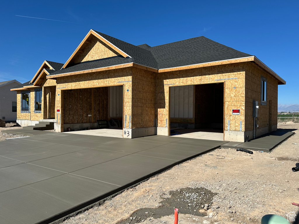 View of front of house with a garage