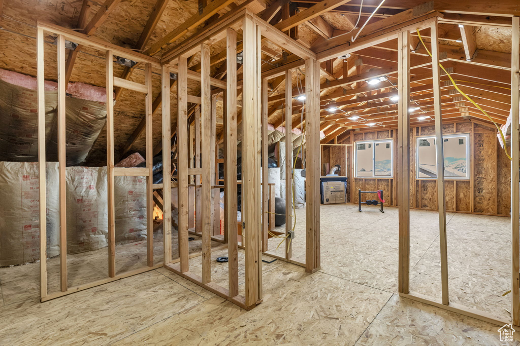 Miscellaneous room with lofted ceiling