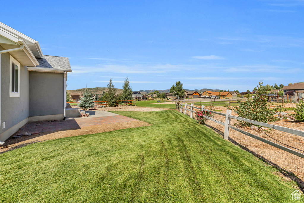 View of yard featuring a patio