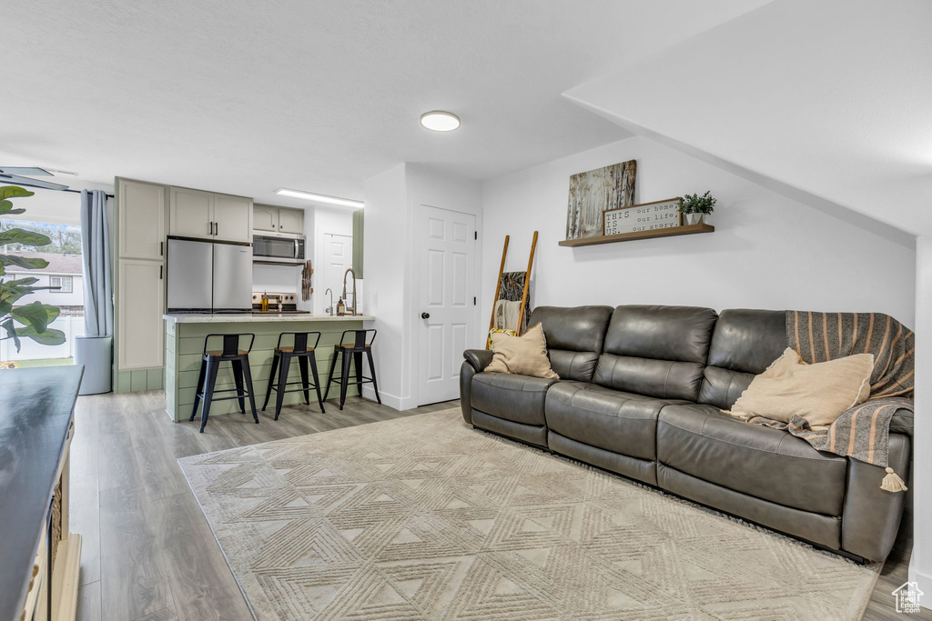 Living room featuring light hardwood / wood-style flooring