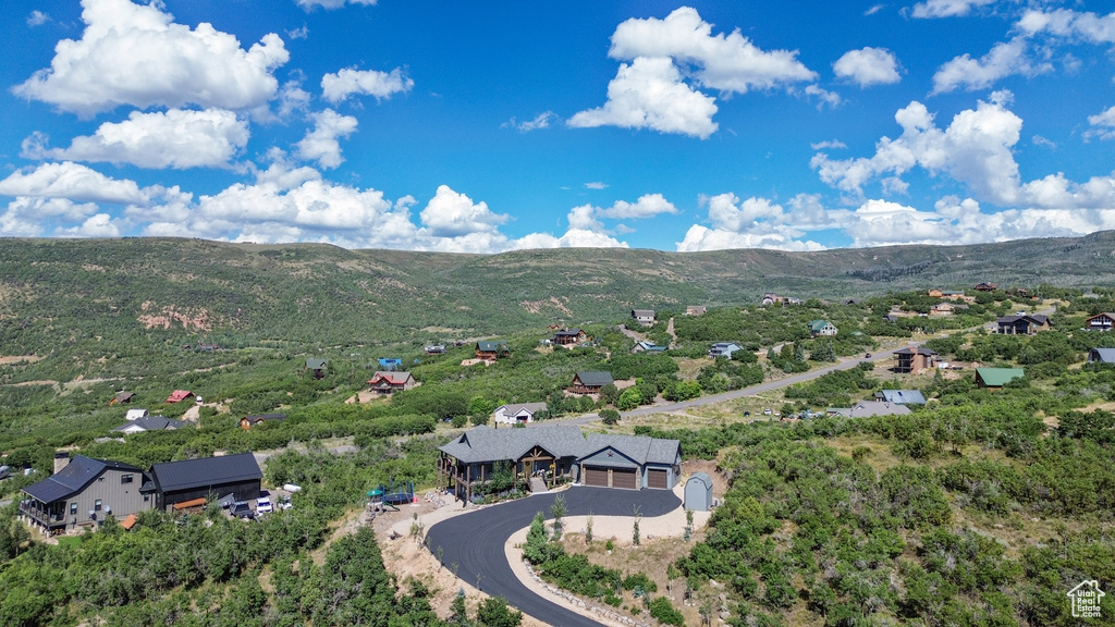 Birds eye view of property featuring a mountain view