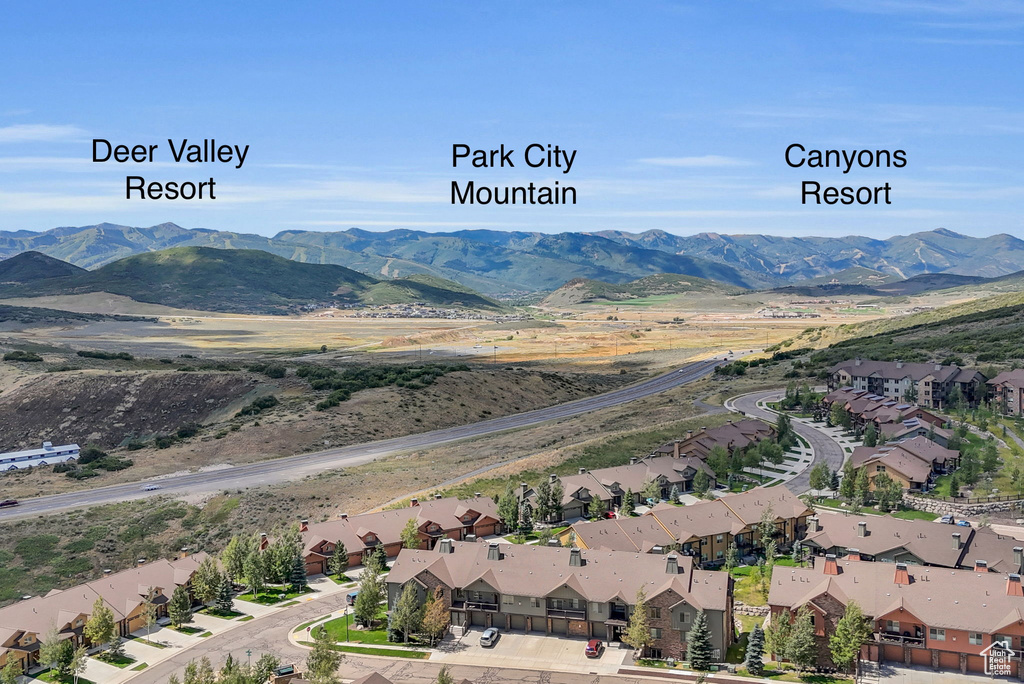 Aerial perspective of suburban area featuring mountains