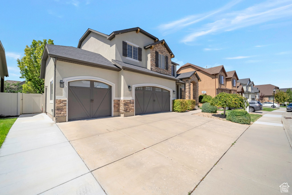 View of front of property with a garage