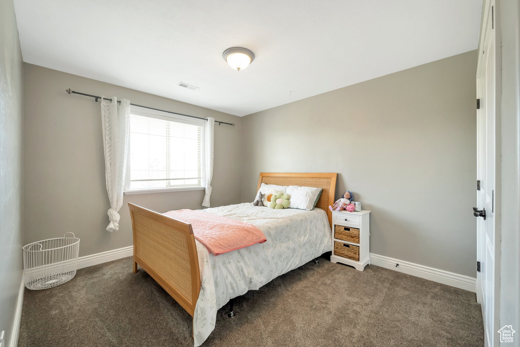 Bedroom with carpet