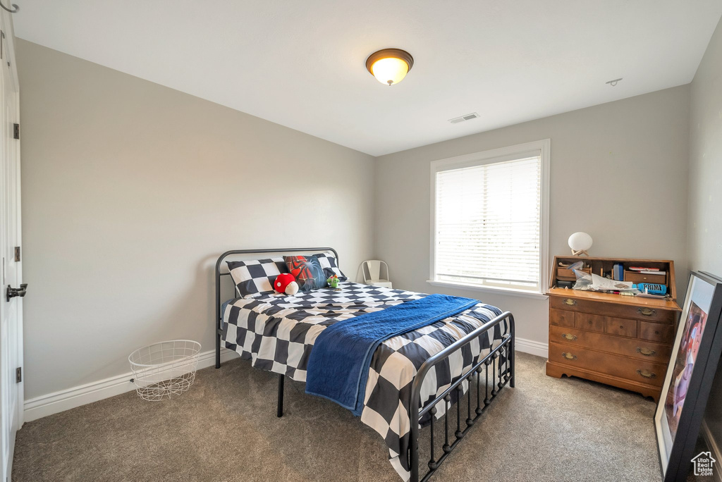 View of carpeted bedroom