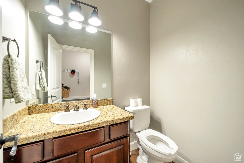 Bathroom featuring toilet and vanity