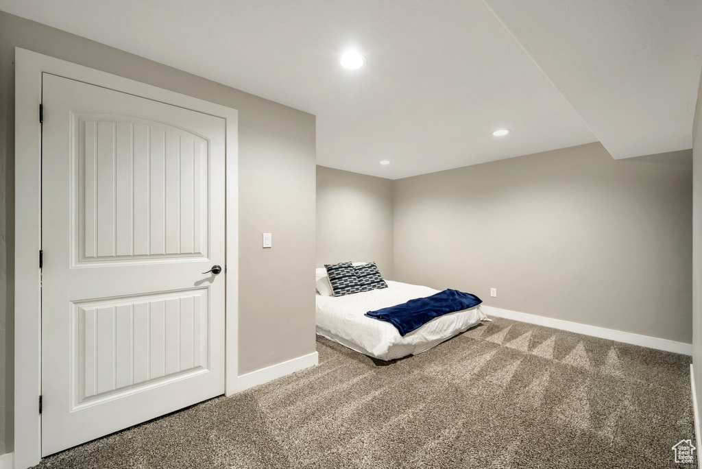 Unfurnished bedroom with carpet flooring