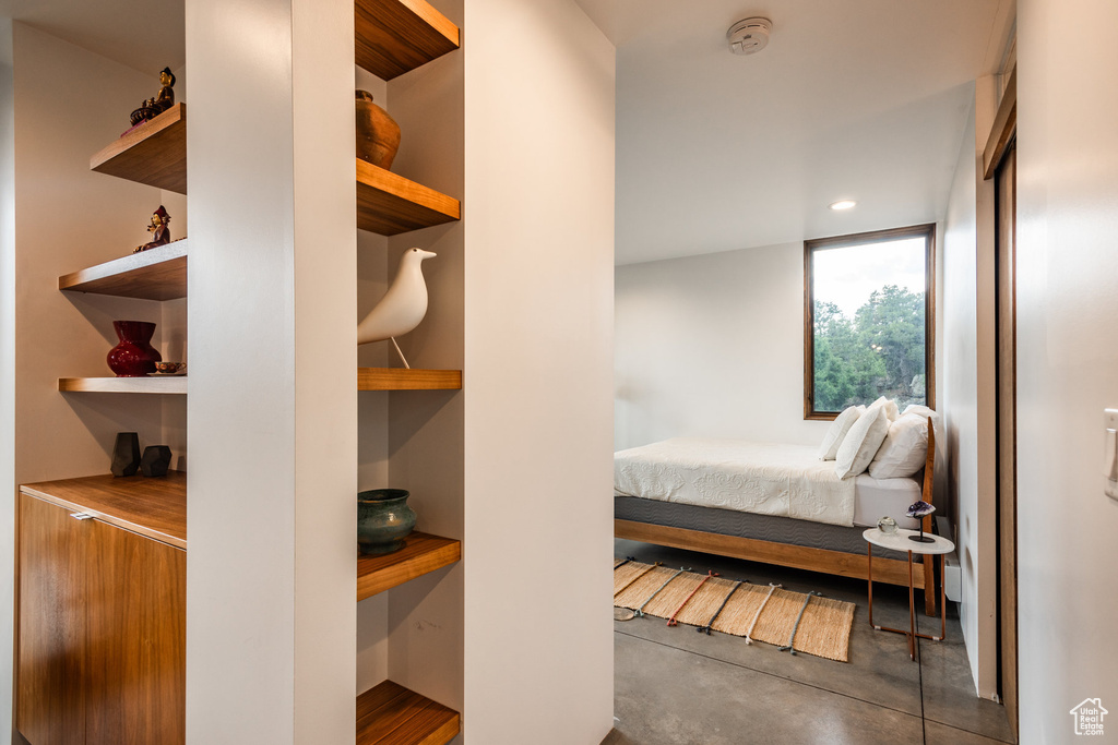 Bedroom with concrete floors