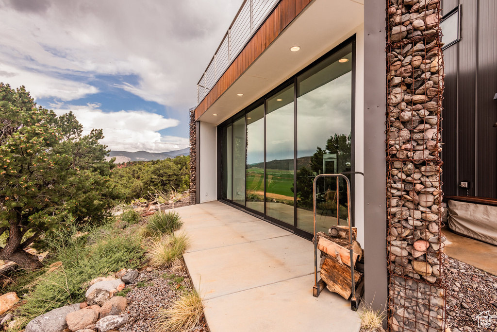 View of patio with a mountain view