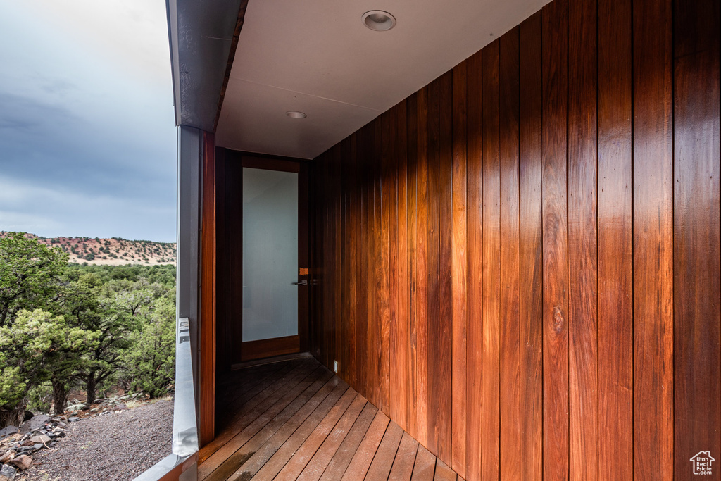 Corridor featuring hardwood / wood-style floors