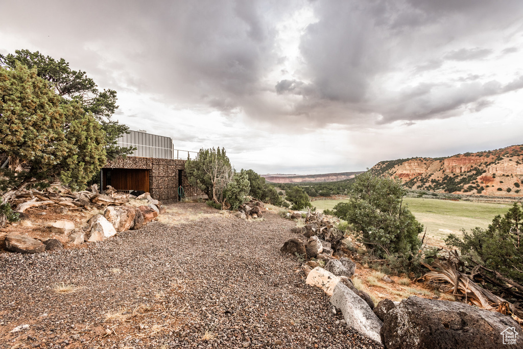 View of yard with a mountain view