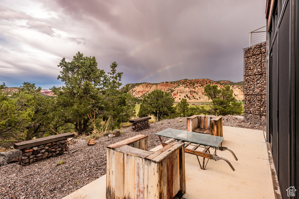 View of patio with a mountain view