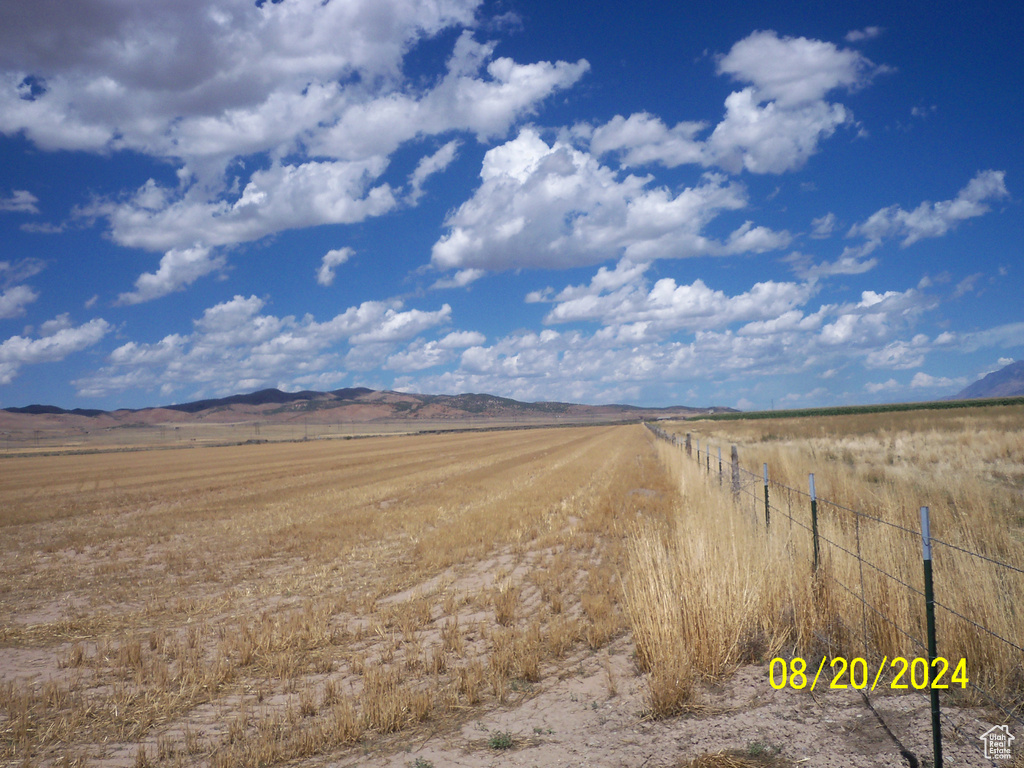 Exterior space featuring a rural view and a mountain view