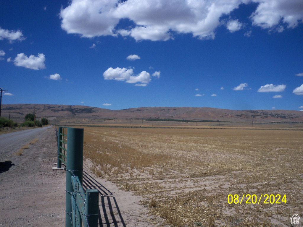 Exterior space with a rural view and a mountain view