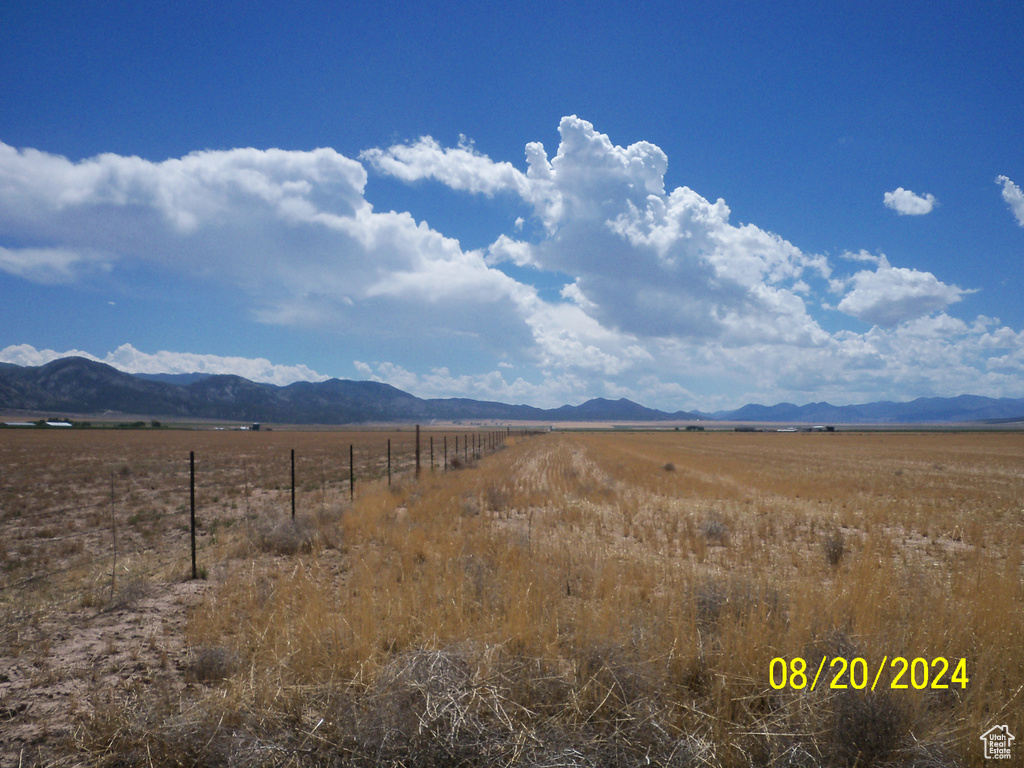 Property view of mountains featuring a rural view