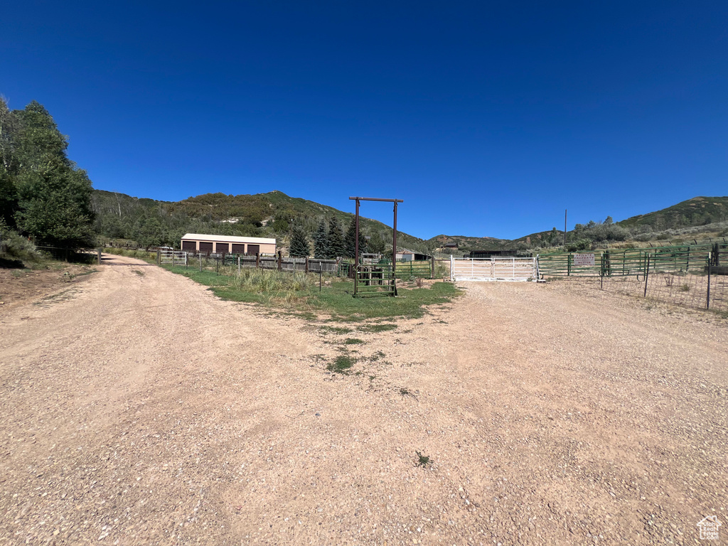 View of street with a mountain view and a rural view