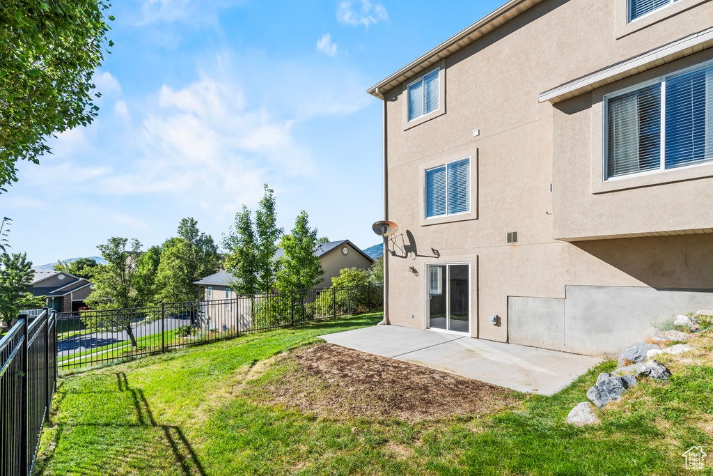 View of yard featuring a patio