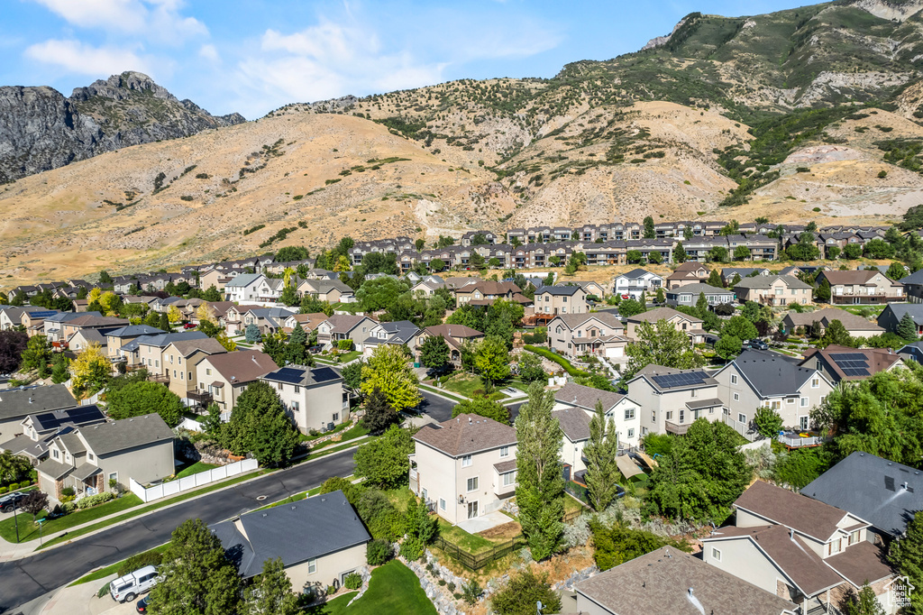 Birds eye view of property with a mountain view