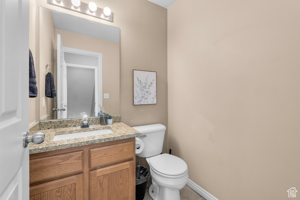 Bathroom with toilet and vanity