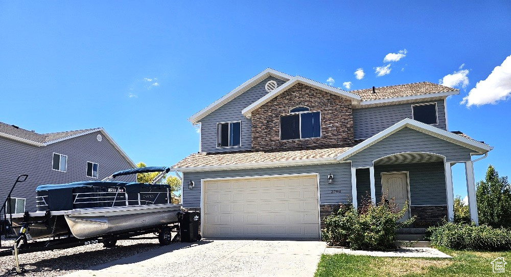 Front facade featuring a garage