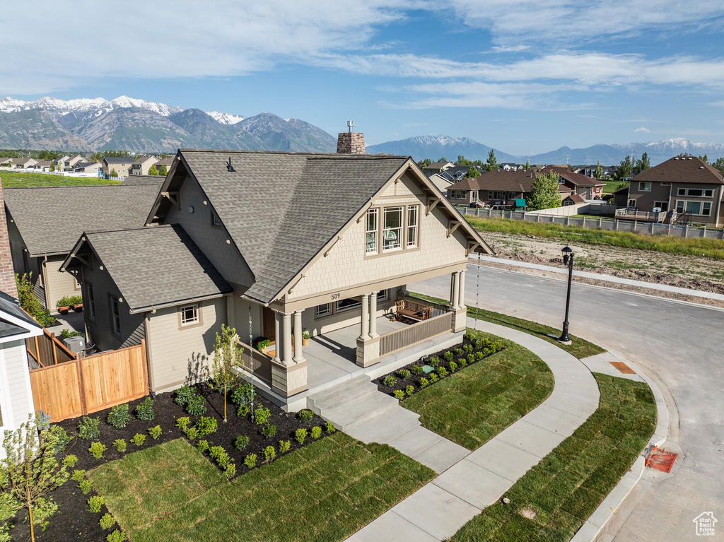 View of front of home featuring a mountain view