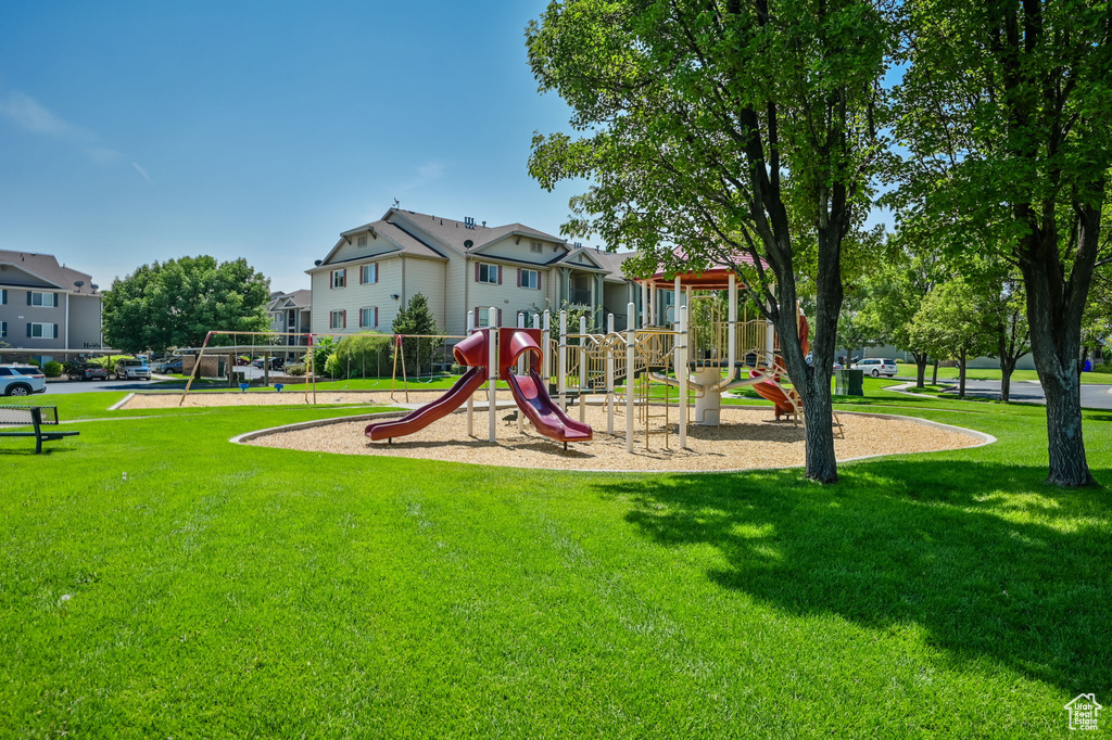 View of playground featuring a yard