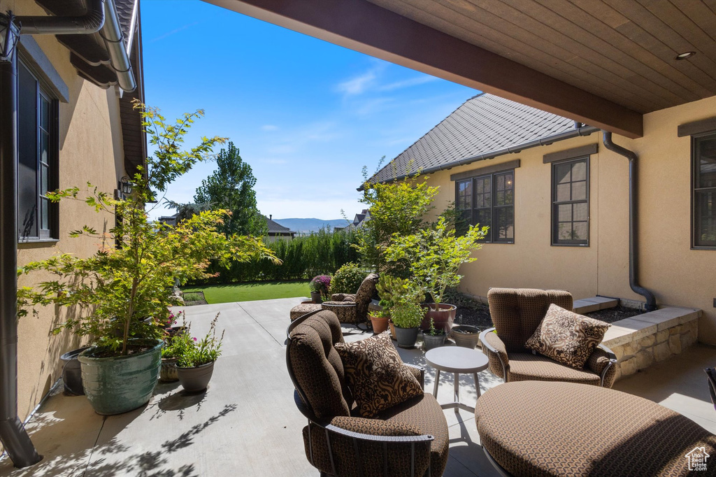 View of patio / terrace with a mountain view