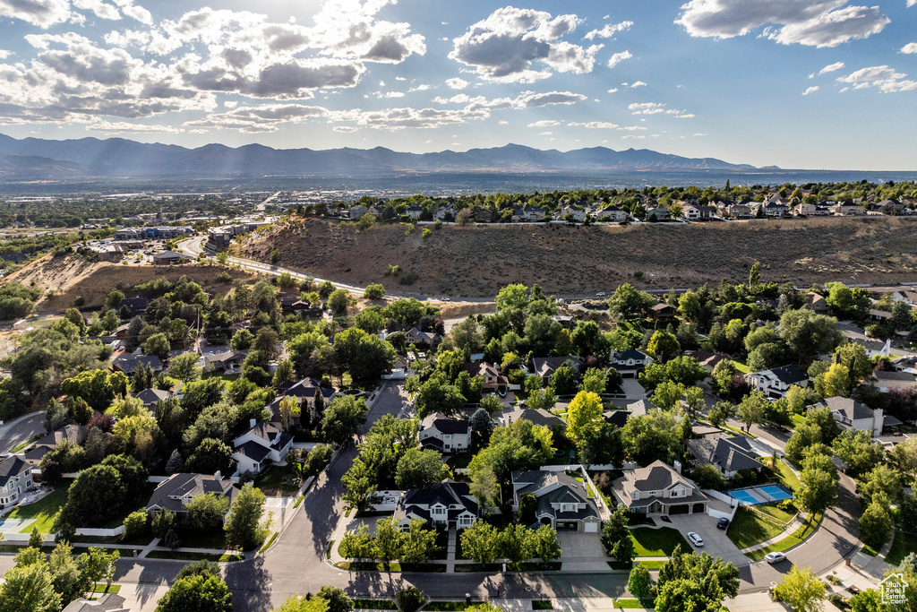 Birds eye view of property with a mountain view