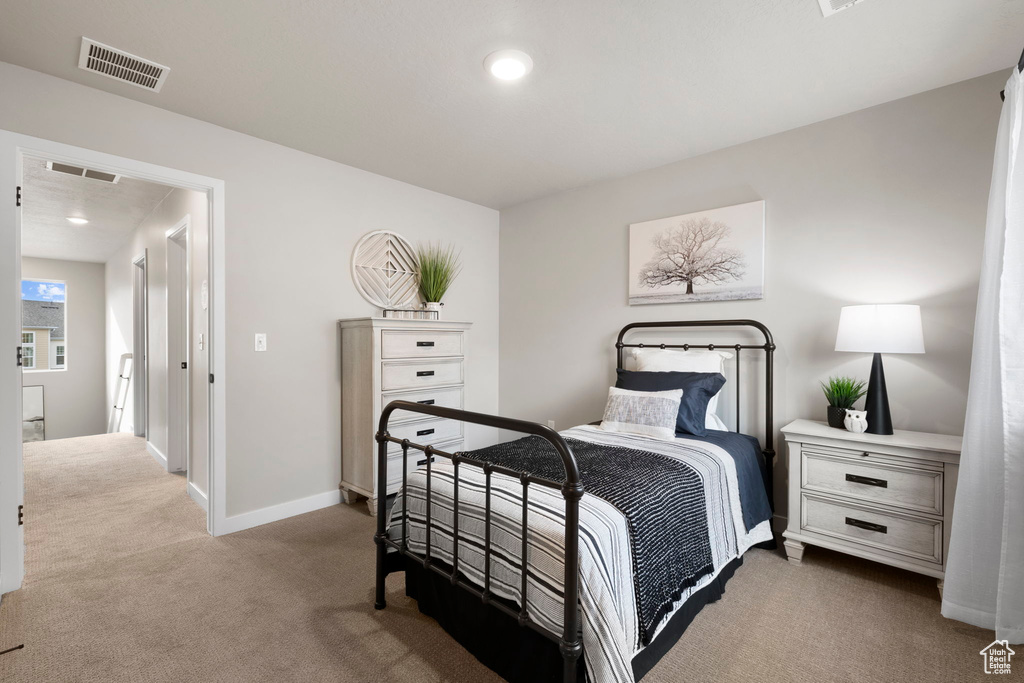 Bedroom featuring carpet flooring