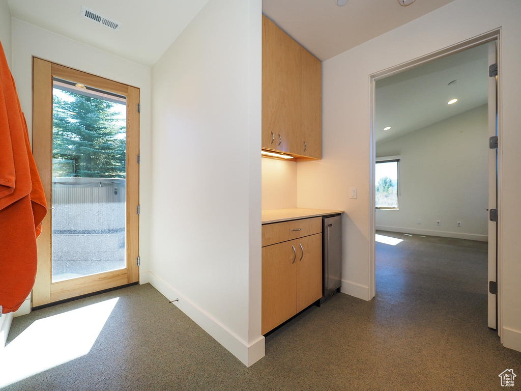 Kitchen featuring lofted ceiling