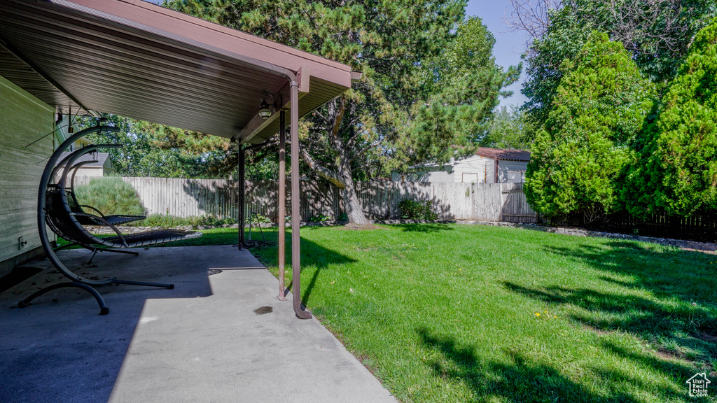 View of yard with a patio area