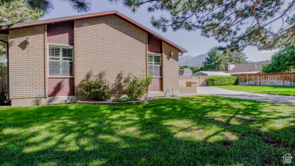 View of front of house with a front lawn