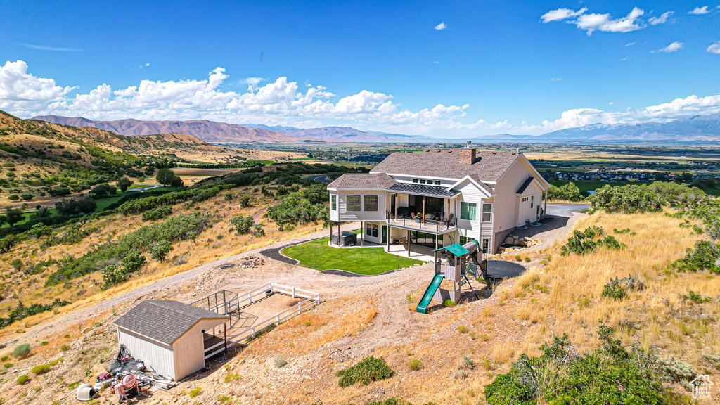 Drone / aerial view featuring a mountain view