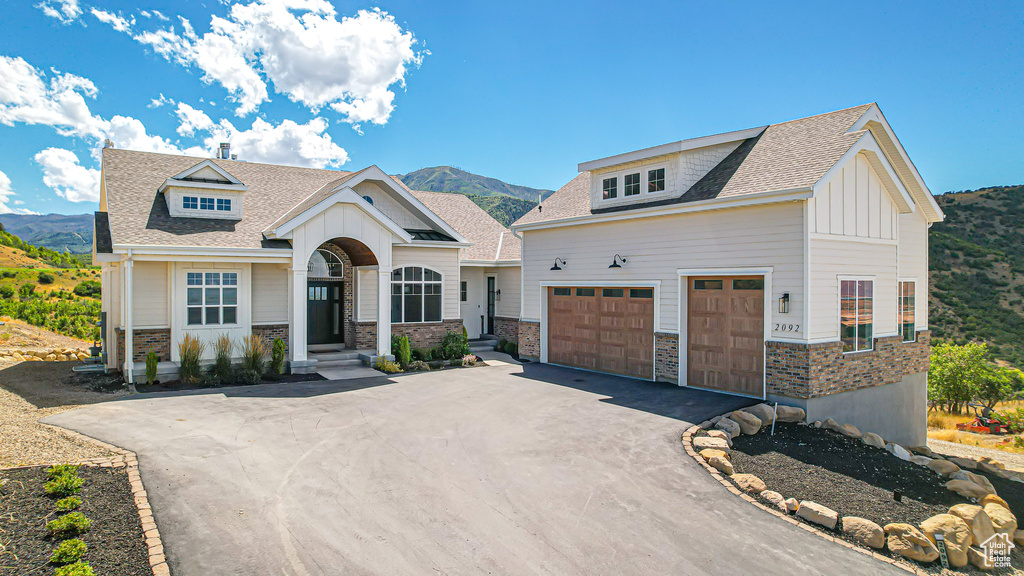 View of front of home featuring a mountain view