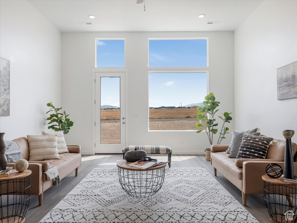 Living room with wood-type flooring