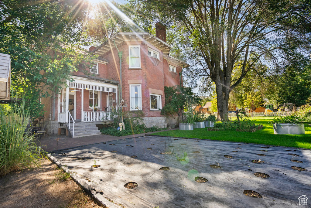 View of front of property with a porch