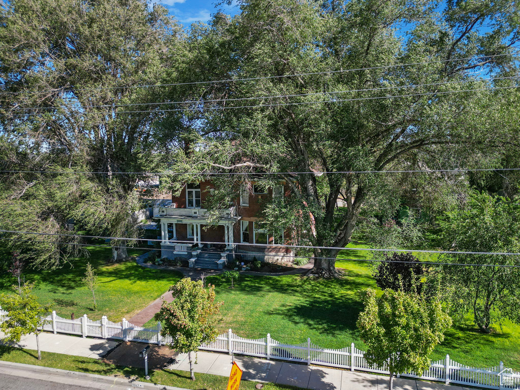 Exterior space featuring a front lawn