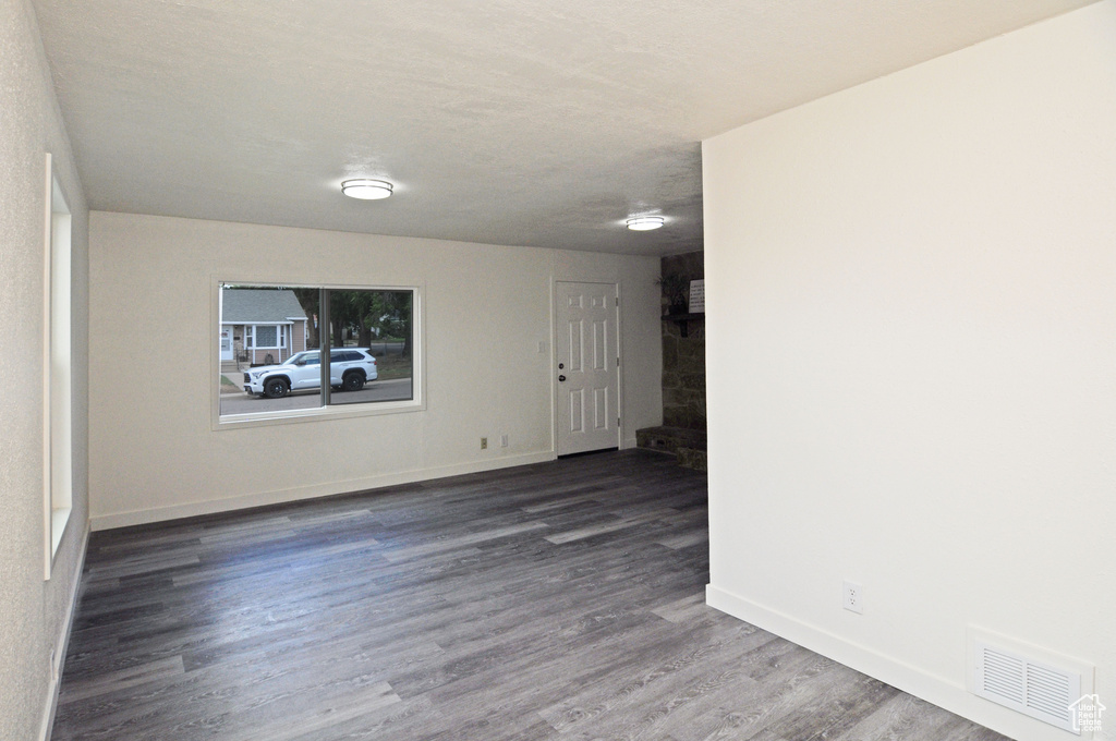 Unfurnished room featuring hardwood / wood-style floors