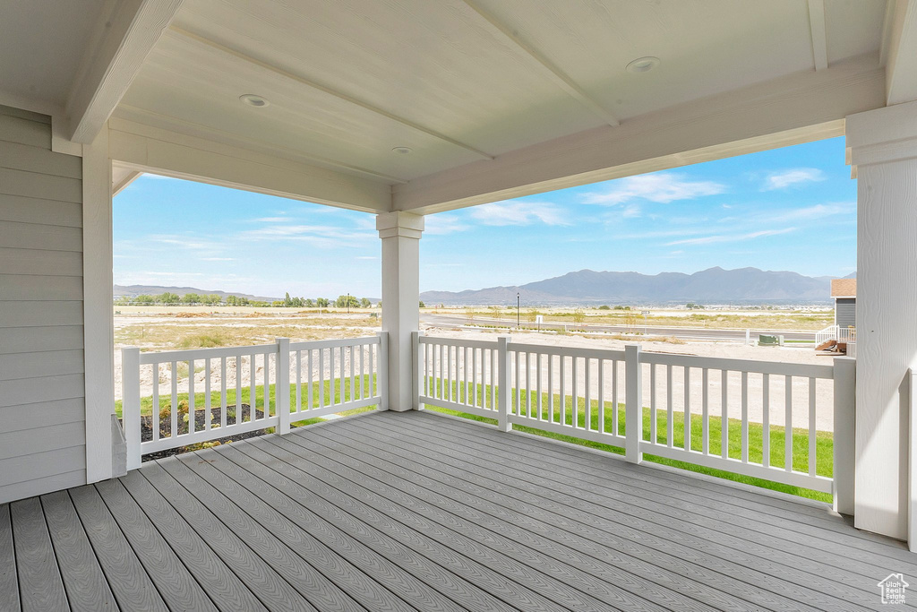 Wooden deck featuring a mountain view