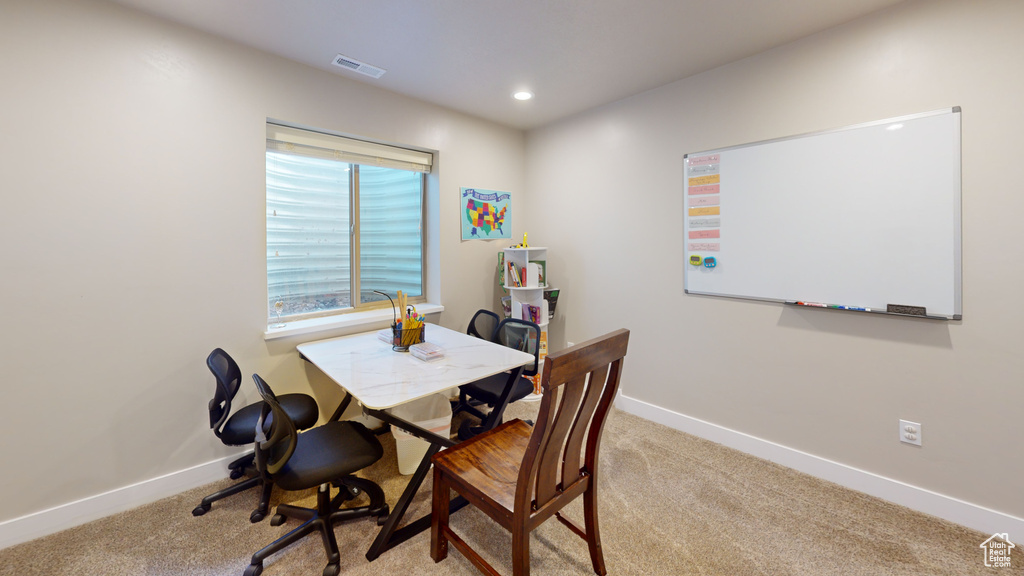 View of carpeted dining room