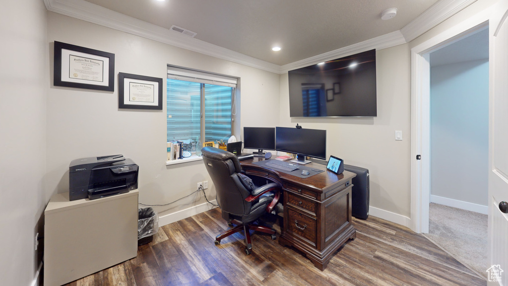 Carpeted home office featuring ornamental molding