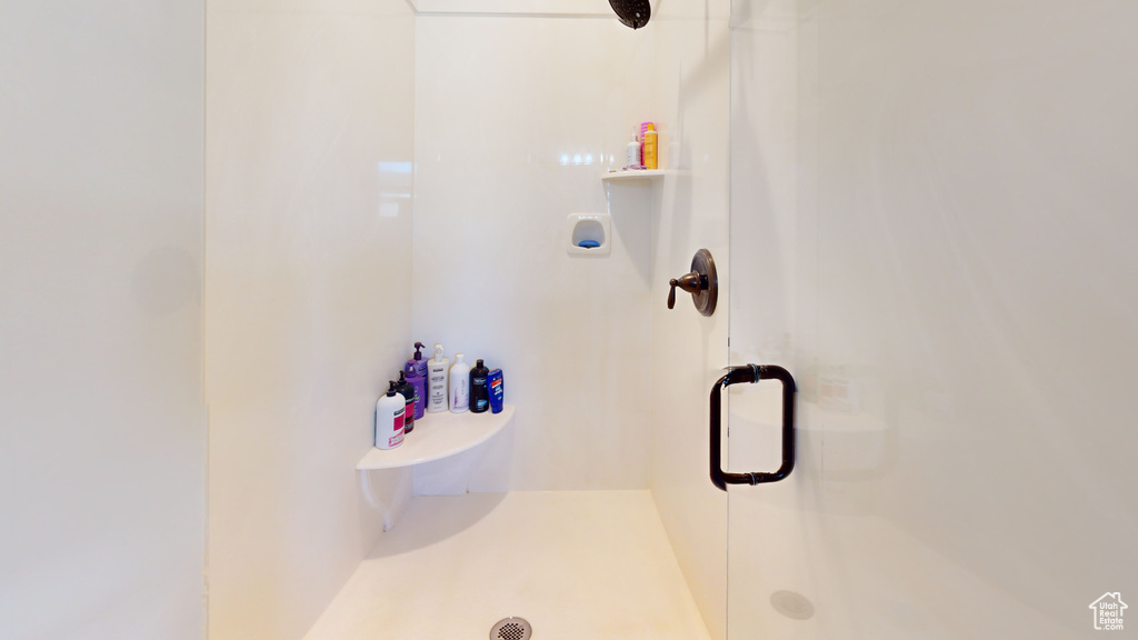 Bathroom featuring walk in shower