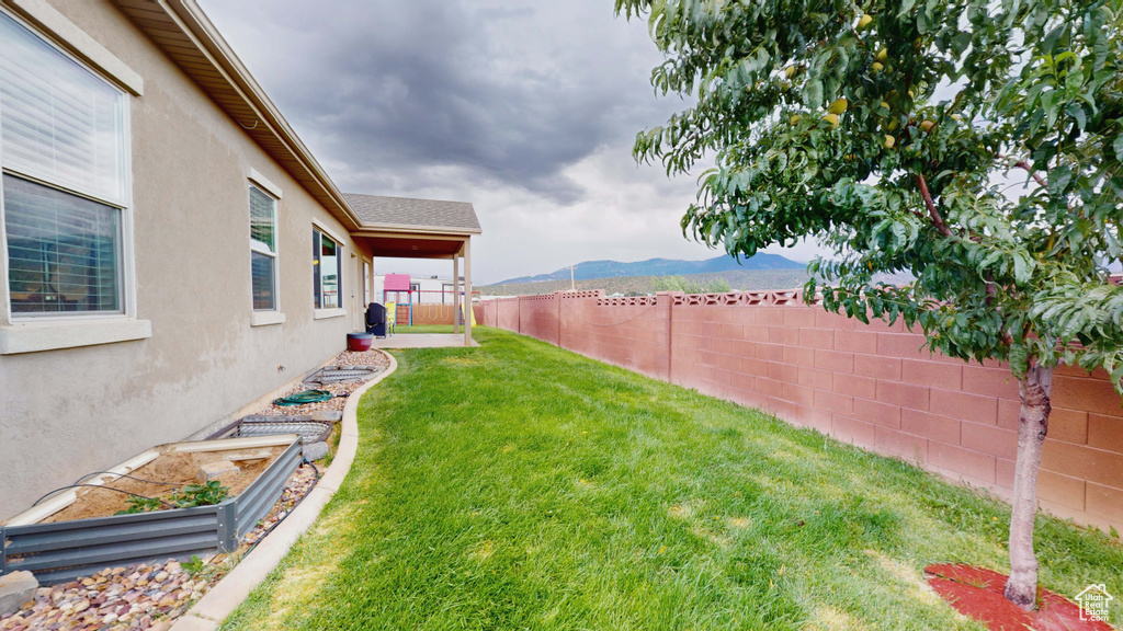 View of yard featuring a mountain view