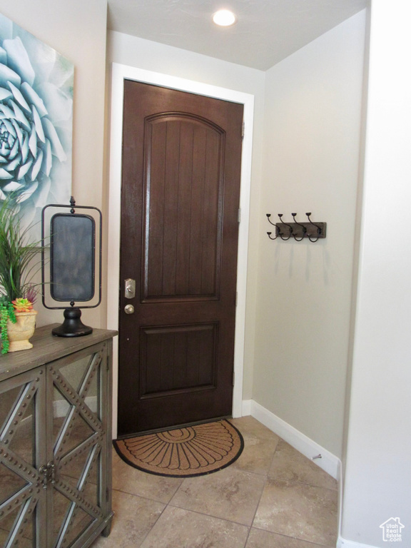 Entryway featuring light tile patterned floors