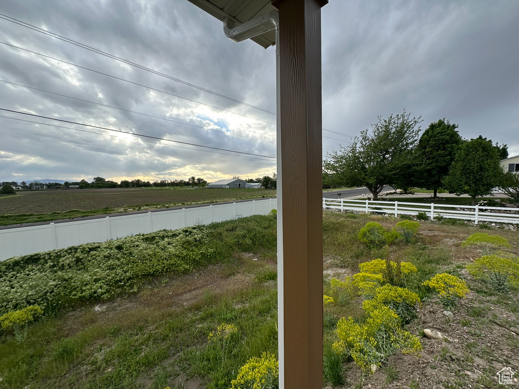 View of yard featuring fence