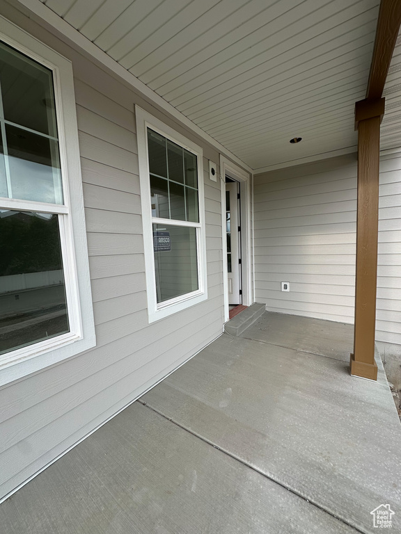View of patio with covered porch