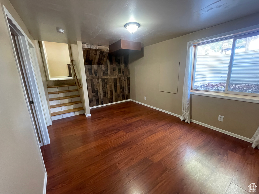 Unfurnished room featuring hardwood / wood-style flooring