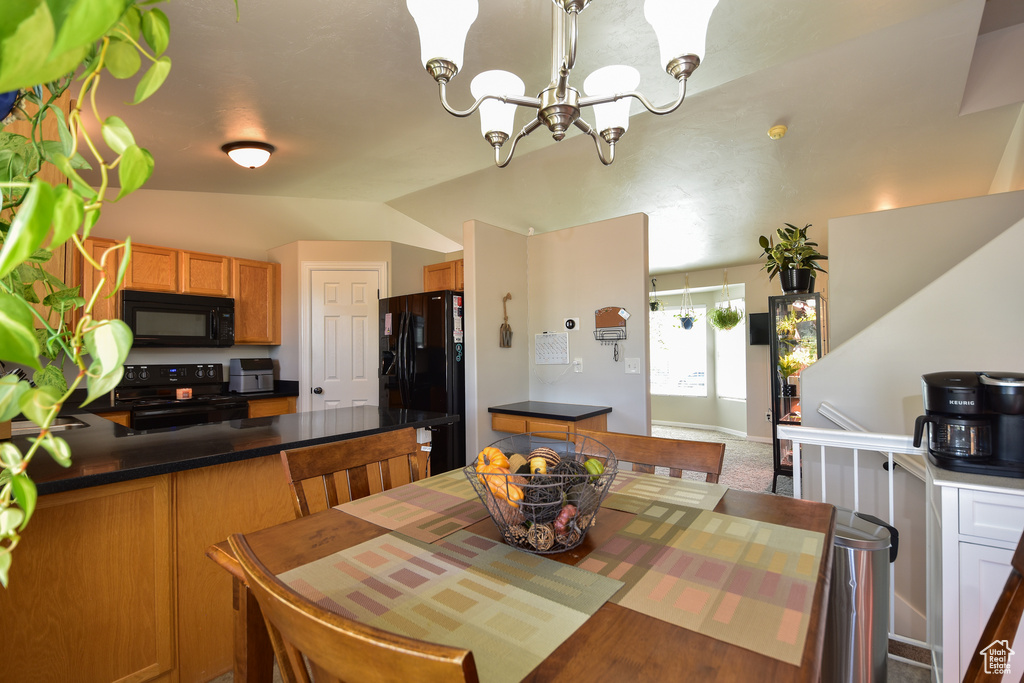 Dining space featuring a notable chandelier