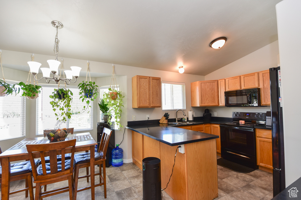 Kitchen featuring vaulted ceiling, light tile patterned floors, sink, a notable chandelier, and black appliances