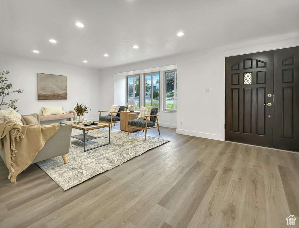 Living room with light wood-type flooring